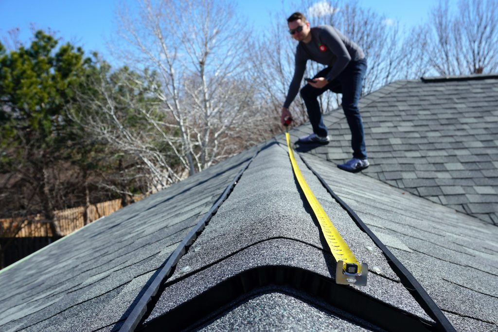measuring a roof before solar panels are installed