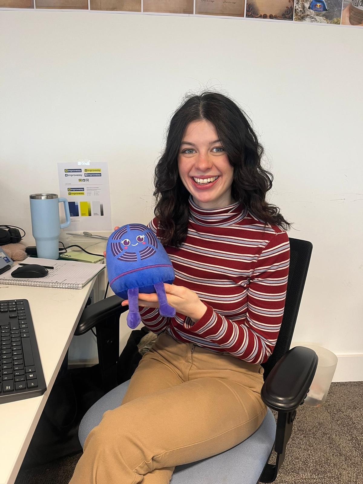 Improveasy staff member with Octopus Trusted Partner mascot