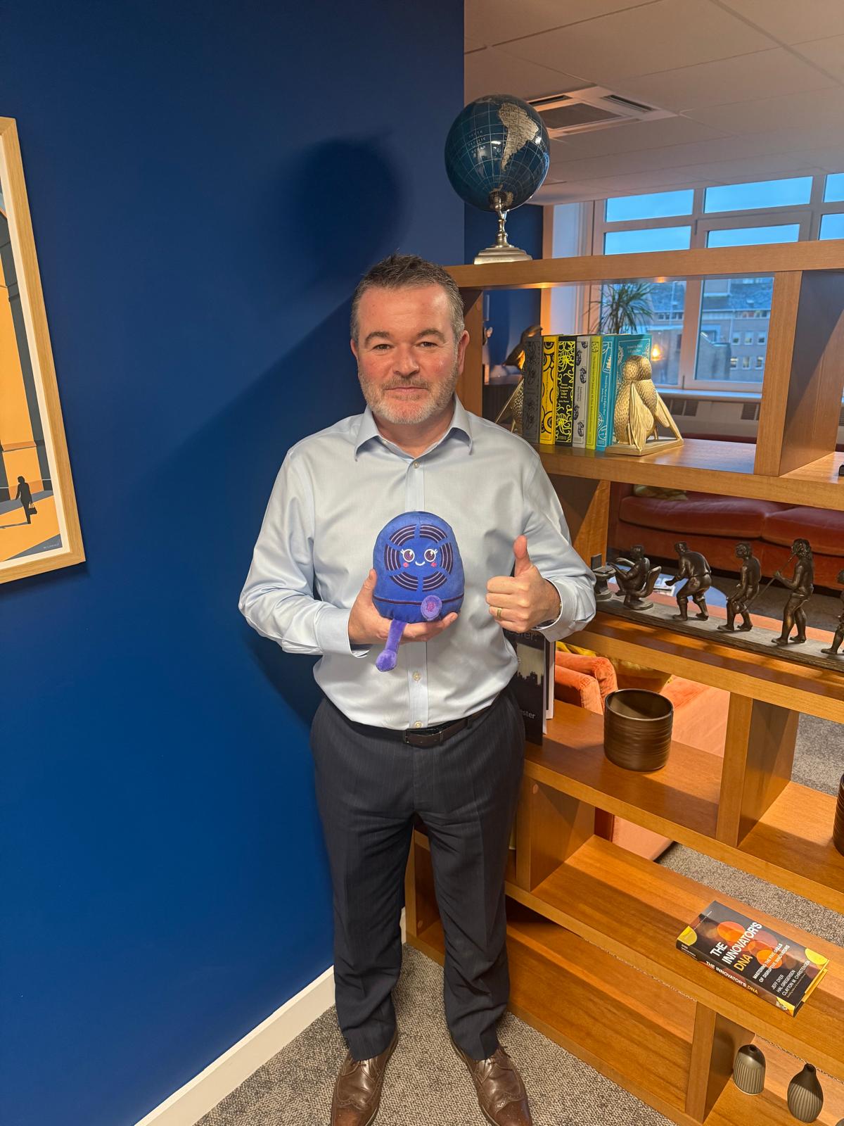 Improveasy CEO with Octopus Trusted Partner mascot